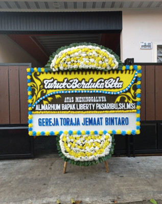 Papan Bunga Duka di Kmp Melayu Tim